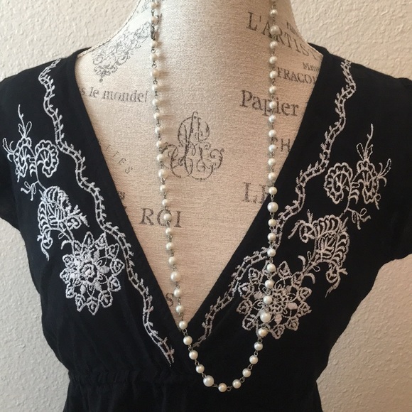 Angie flirty black dress! Embroidered top and hem. - Picture 2 of 8